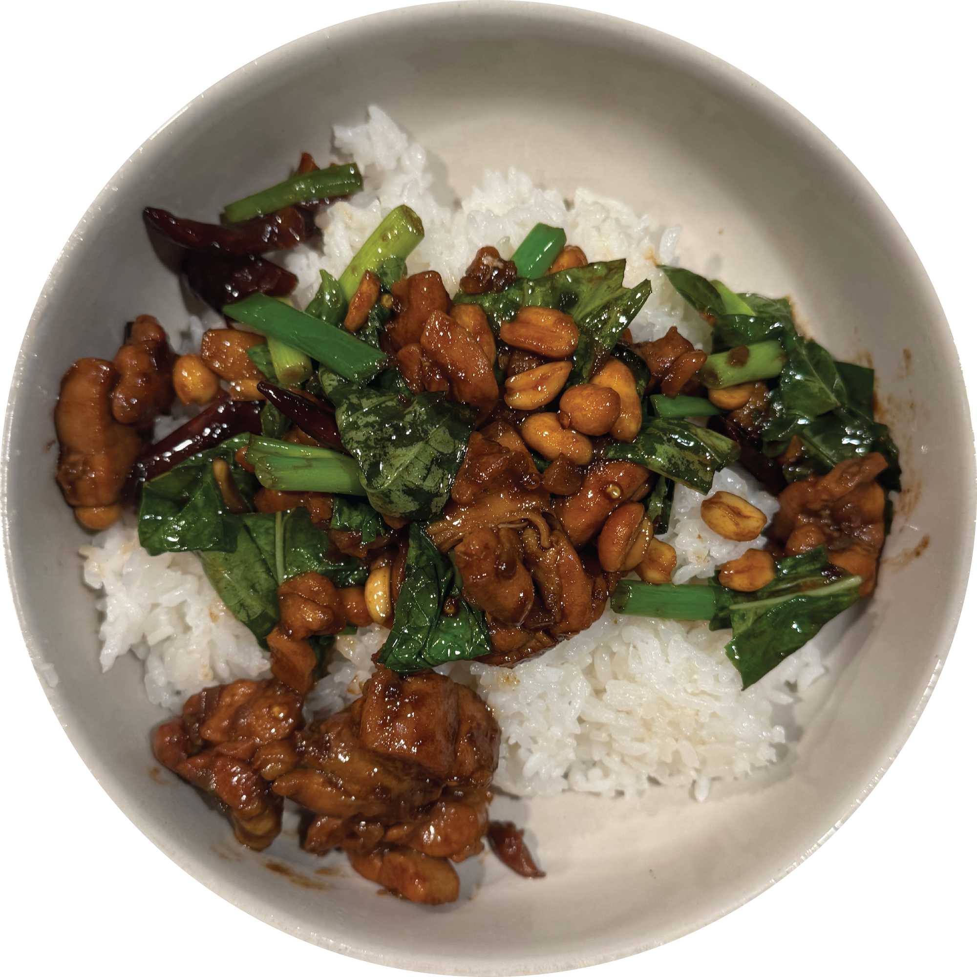 A bowl of Taiwanese three cup chicken over white rice